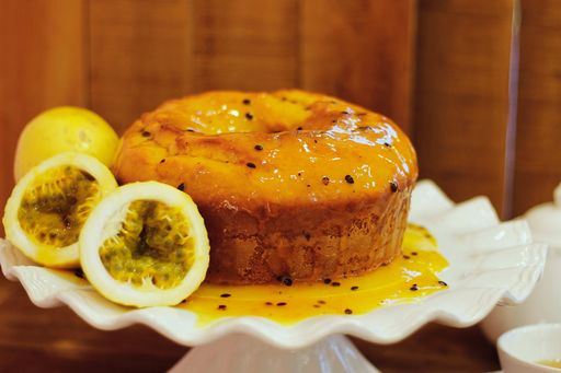 A closeup shot of a passion fruit pie with cut passion fruits next to it. Great for a culinary piece
