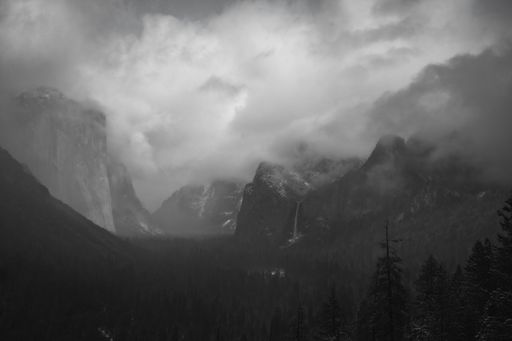 The snow covered mountains of Yosemite, California on a stormy day