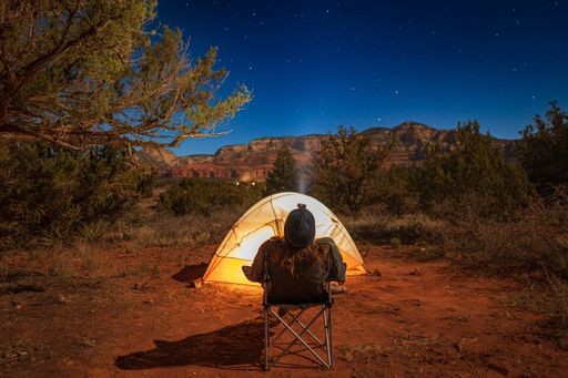 Sedona summer Night at the Campsite looking at the Stars before going to bed in the tent nightscape