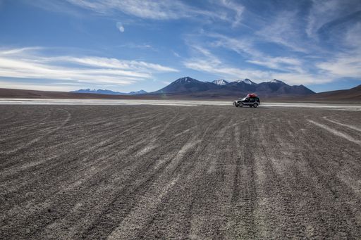 A mesmerizing shot of a camping truck parked near Miscanti Lake in Antofagasta Chile