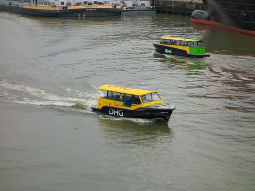 Water Taxi underway in waters of Rotterdam. Two taxis passing each other in Merwehaven.