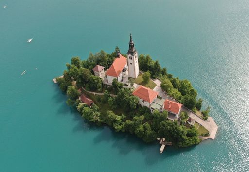 An aerial view of the Assumption of Maria Church on island on lake Bled in Slovenia