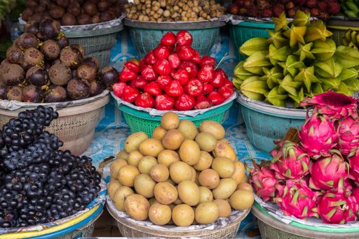 A closeup shot of assorted fruits displayed in a Balinese market