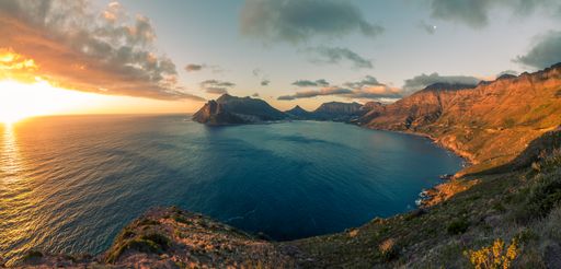An aerial view of the sunset over the Chapmans Peak Drive, Cape Town, South Africa