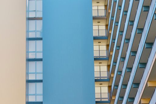 A low angle closeup shot of facade of a building with balconies