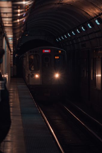 A vertical shot of a train arriving at the station