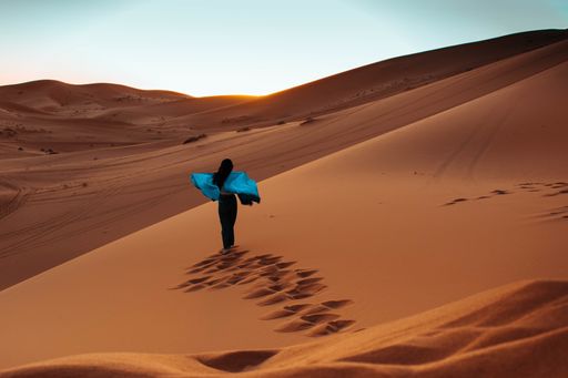 A beautiful shot of a young female walking on a deserted place