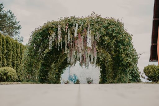 A beautiful shot of a decorated outdoor wedding ceremony reception