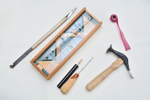 A closeup of the carpenter tools isolated on white background.