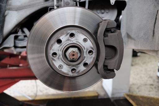A closeup shot of a disc brake of a vehicle