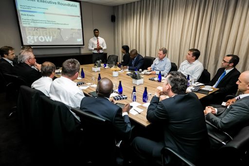 A boardroom meeting and presentation with diverse businessmen in Johannesburg, South Africa