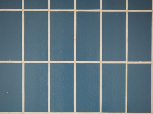 Blue tile wall made of same squares, use for backgrounds or texture