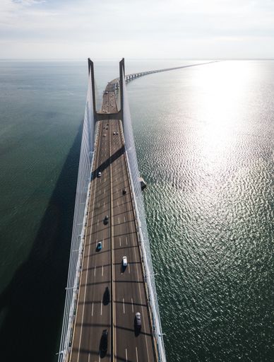Aerial view of the Vasco da Gama Bridge in a sunny and clear day, Lisbon, Portugal