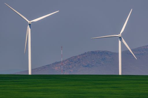 A beautiful shot of windmills in a valley in Dobrogea County Romania