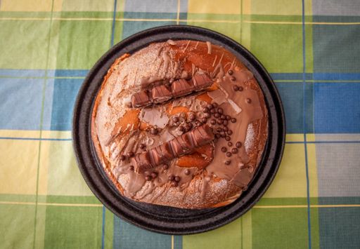 Picture of Huge Easter 'Mona' Sweet Made of kinder Chololate Bars Filled with Kinder Cream Inside Ready to Eat. Unhealthy Cake Seen from Above