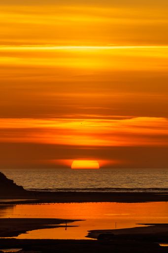 A vertical shot of a beautiful sea in Texel, Netherlands
