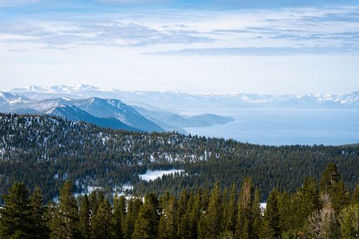 A scenic view of Mount Rose Trial looking down toward Lake Tahoe and Crystal Bay in Nevada, USA