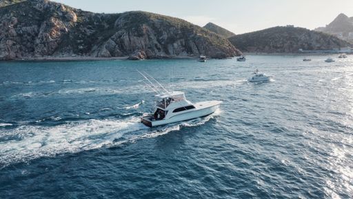 A sportfishing boat sailing on the water near Cabo, Mexico