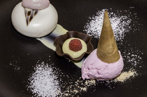 A delicious ice cream on brown cake