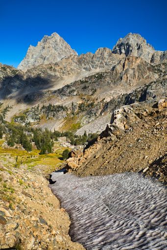 A vertical shot of the rocky Grand Teton National Park, WY