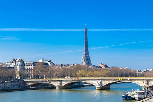 Paris, the Invalides bridge on the Seine, with the Eiffel Tower in background