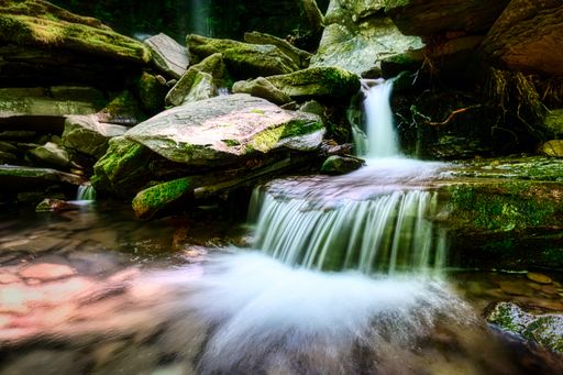 A beautiful shot of flowing river with big rocks