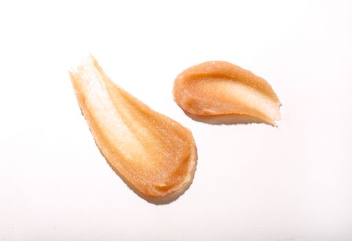 A Texture of brown Creamy drop skincare cream product lotion