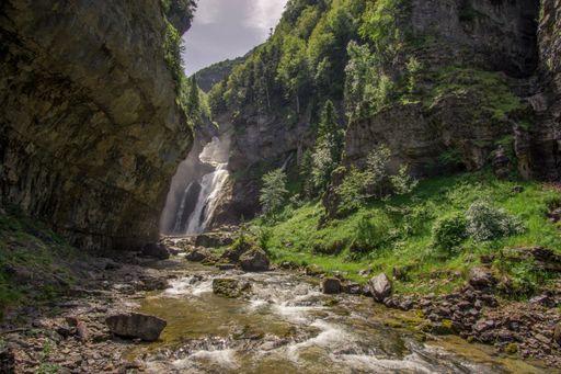 The Estrecho waterfall with a river in Ordesa y Monte Perdido National Park, Pyrenees, Spain