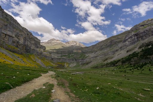 A view of a beautiful hiking trail surrounded by amazing nature in the Spanish national park Ordesa y Monte Perdido