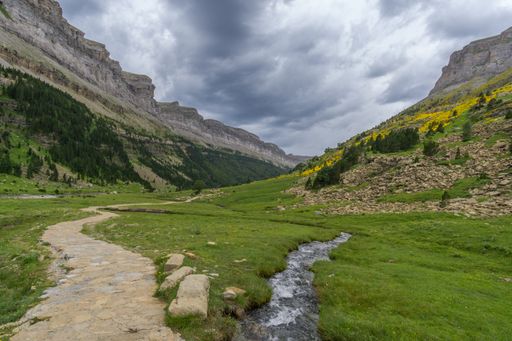 A view of a beautiful hiking trail surrounded by amazing nature in the Spanish national park Ordesa y Monte Perdido