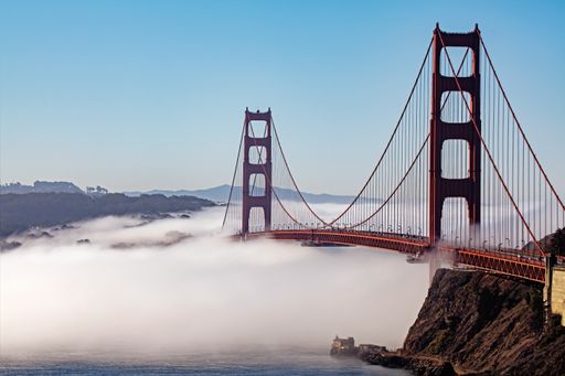 A beautiful shot of the Golden Gate Bridge surrounded by clouds