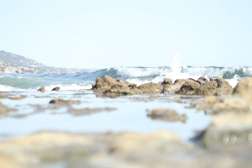 A selective of sea waves on a stony beach