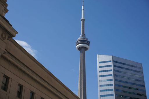 A closeup shot of the CN Tower on a sunny day in Toronto, Canada