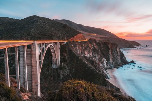 A beautiful shot of a sunset over the Bixby Creek Bridge on the Big Sur coast of California