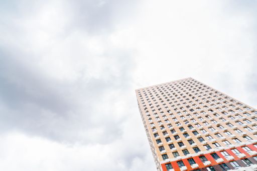 A low-angle shot of the residential building against the cloudy sky. Moscow. Russia.