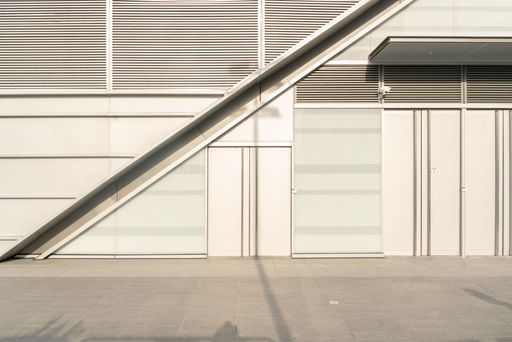 A closeup shot of a modern building's wall under the sunlight