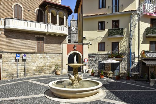 A small fountain on a street of Lenola, a village in Lazio region, Italy