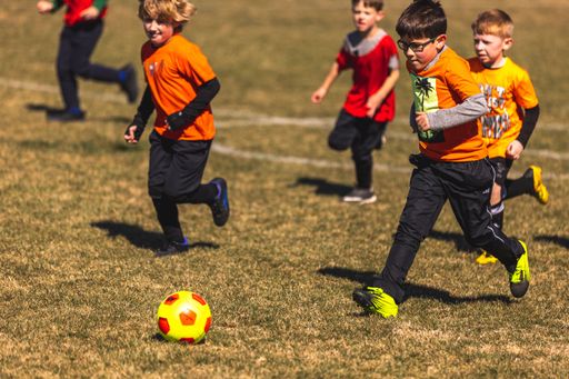Young soccer players playing on a field in Fort Worth, United States