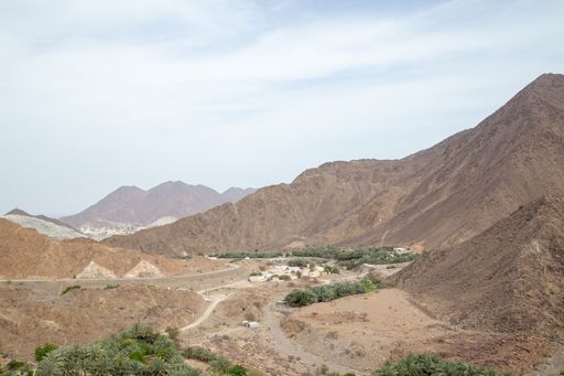 desert path with mountains and valleys dry out of focus with grain daytime