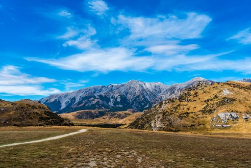 A beautiful view of a landscape with mountains under cloudy sky in South Island, New Zealand