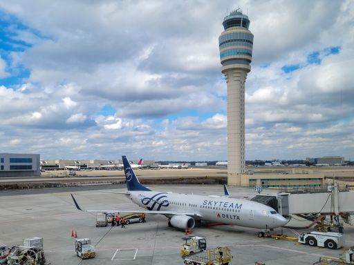 The Delta Boeing 737 NG in Skyteam livery (reg: N3761R) at Hartsfield-Jackson Atlanta International Airport with control tower