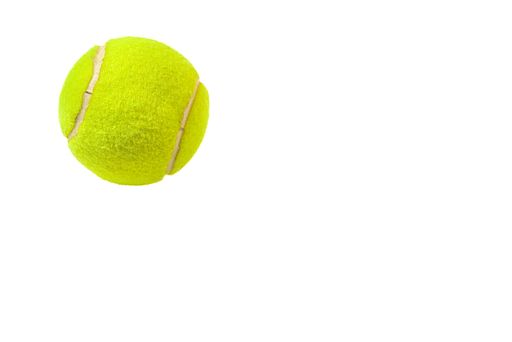 A tennis ball in the upper left side on a white background-space for your text