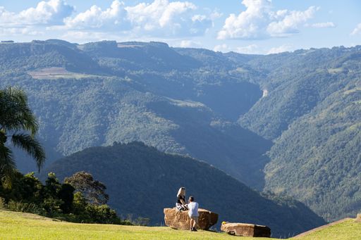 Nova Petropolis, Rio Grande do Sul, Brazil - Apr 19th, 2022: Tourists taking a photo at Parada da Torre Viewpoint in a beautiful sunny day