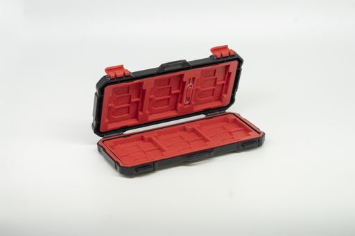 A closeup shot of an opened empty toolbox on the white background