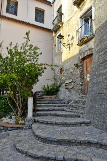A narrow street with old buildings in San Nicola Arcella, village of Calabria region, Italy