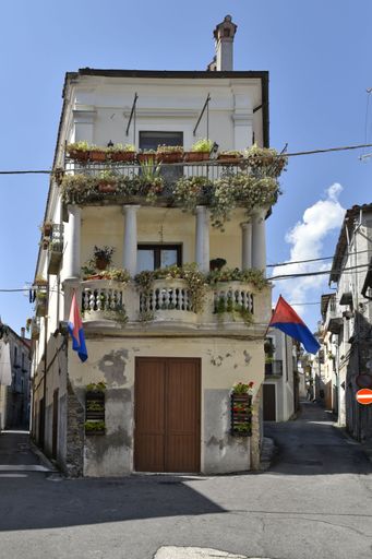 A narrow street among the old houses of Laino Borgo, a rural village in the Calabria region, Italy