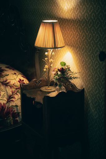 A beautiful interior shot of candles, books and lights on a table in Asheville, North Carolina during the Christmas Holidays