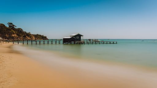 A shelly beach hut on the pier near Portsea, Victoria down the Mornington Peninsula
