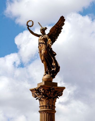 A vertical shot of the Statue of Victoria in Prague, Czech Republic