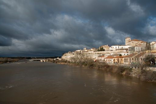 A beautiful view of the River Duero in its passage through Zamora under foggy clouds, Spain
